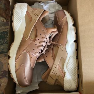 Rose gold Nike Huaraches